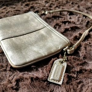 Coach gold wristlet